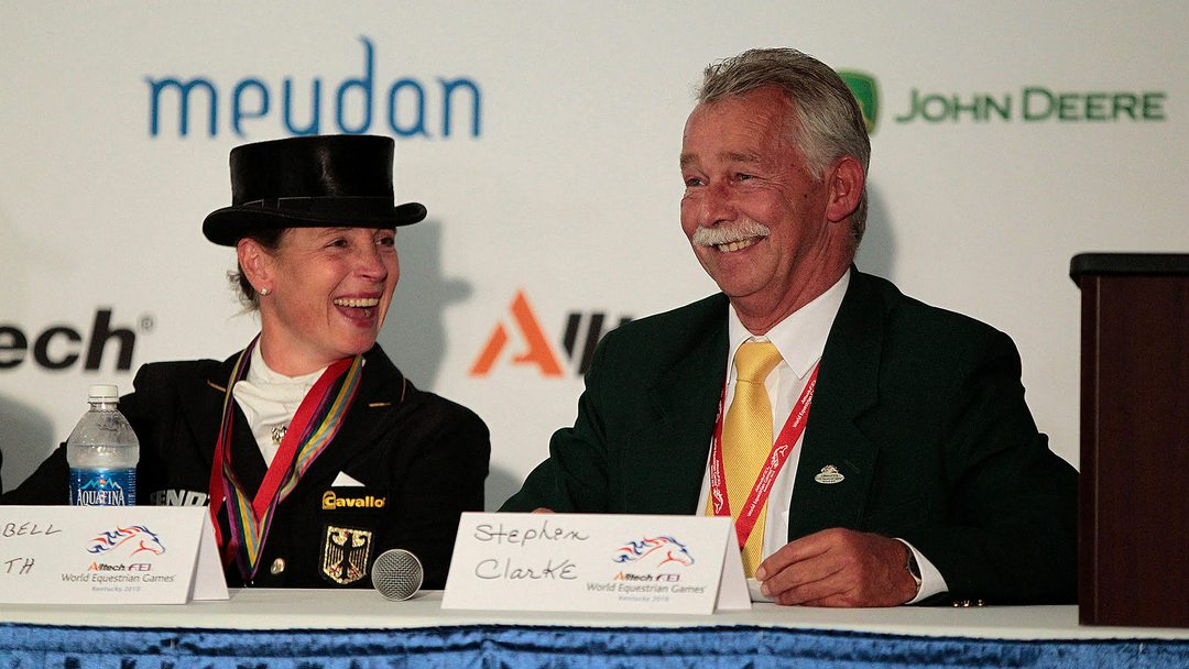 Stephen Clarke laughing with Isabell Werth in a press conference