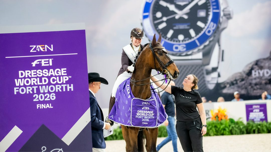 British dressage rider Becky Moody sitting on her horse, Jagerbomb, with her groom, Kim Masson, standing by her side during the prizegiving at the 2026 World Cup Final in Fort Worth, Texas.

