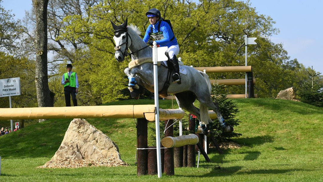 Dani Stewart-Richardson (née Evans) and Smart Time jump a cross-country fence at Badminton 2018.

