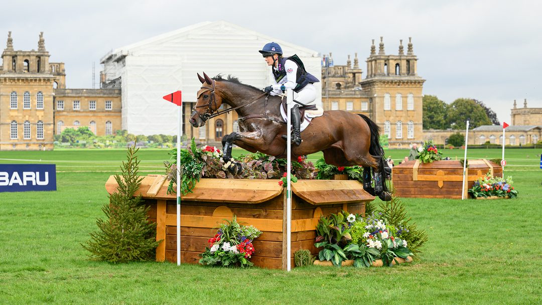 Caroline Harris and D.Day, British squad members for the 2026 World Championships, jump a cross-country fence at the European Championships at Blenheim in 2025